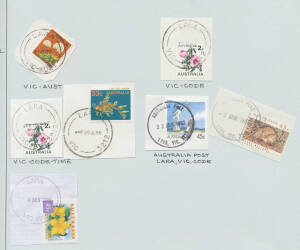Remainders in seven albums from Colonial era to modern with datestamps and some numeral cancels including ties on Solicitor-General Frank Stamp circulars and QVic postal cards, noted many on piece and plenty of KGV Heads with a few covers also, primarily 