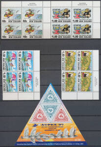 Four large stockbooks with decimal blocks of 4 or larger plus M/Ss, unmounted. Face value stated to exceed $NZ2600.
 (Qty)