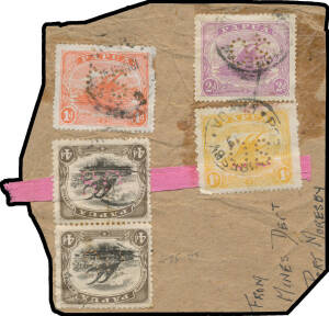 OFFICIAL MAIL: 1919 parcel piece endorsed "From/Mines Dept/Port Moresby" with rare Two Issue Franking of Lithographs 4d pair (one with Defective '4' at Left) plus Monocolours 1d 2d & 1/- all punctured 'OS' tied by Port Moresby cds of 19NO19, with a piece 