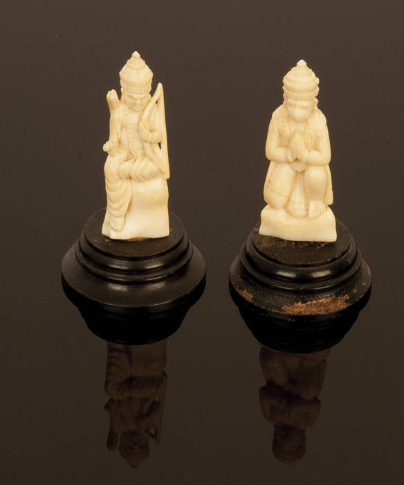 IVORY: 2 carved Indian Hindu God figures & 2 carved seated Buddhas (one in glass dome with carved cork diorama). Halo misssing on one Buddha statue otherwise good condition.