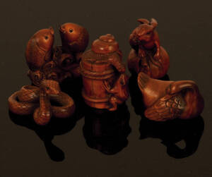 NETSUKE: Japanese boxwood carvings; frogs, fish, rabbits, snakes & assorted animals. 20th century excellent condition