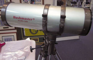 BUSHMASTER MARS 1400 telescope with tripod & additional lenses. Original box & instructions. Also includes a selection of astrological reference books & charts. Excellent condition.