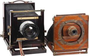 ANTIQUE CAMERAS: Kodak 5 x 7 View camera (modified to take 4 x 5 inch film) plus an antique expanding timber & brass camera with "Robbins Photo Depot...Liverpool" makers plaque. Fair condition