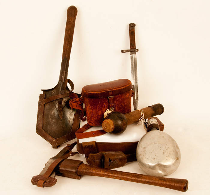 WW1 TRENCH WARFARE: Collection of Austro-Hungarian military equipment; waistbelt (with canteen, bayonet & ammo pouches); trench axe & spade with leather fittings; wire cutters; Austrian ball club; pistol holster; ammo pouches (7); Binocular case; canvas p