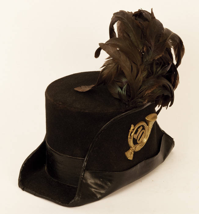 Collection of military hats; Noted, Austro-Hungarian SHAKO with horse hair tassle & regimental badge; (2) Felt hats with regimental badges (one with feather plume). Good condition.