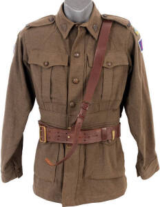 Australian WW2 Army uniforms: (3) tunics with "Rising Sun" badges and military patches; matching berets (2); trousers (2), and bandoliers (2). Noted accoutrement belonging to Capt. R.A.Holland VX 91953. Some moth and silverfish damage. Fair to good condit