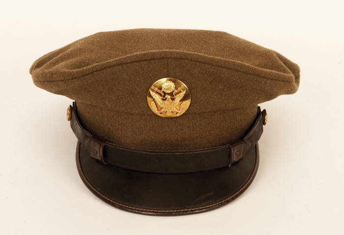 AMERICAN & AUSTRALIAN OFFICER'S CAPS: Royal Australian Infantry Corps (3) peaked officers caps one with regimental badge, English and Australian made. G/VG condition; American officers visors (2), Vietnam period. Excellent condition.