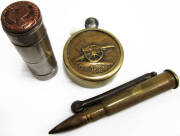 WW1 Austrailan Service Medal belonging to Corp. D.Rose 21st Batt. A.I.F; (3) trench art lighters. Brass .30 caliber round lighter with removable tip; attractive circular brass lighter small polished tube with Australian map at one end with a crown that re - 2