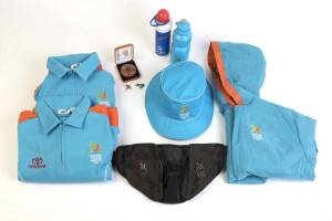 2006 COMMONWEALTH GAMES IN MELBOURNE, Group with Participation Medal in original presentation case; shirts (2), trousers, jacket, hat, bum-bag, drink bottle & security pass.