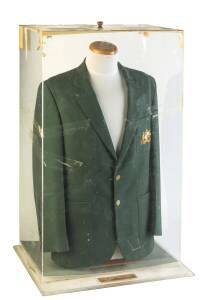 GREG MATTHEWS' AUSTRALIAN TEST BLAZER, green wool with Australian Coat-of-Arms embroidered on pocket, in perspex display case, overall 55x88x33cm. [Greg Matthews played 33 Tests & 59 ODIs 1983-93].