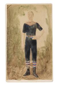 c1882-99 hand-coloured carte-de-visite of a footballer, by Bendigo Portrait Rooms, F.De Kock & Co., Photographic Artists. Dark jumper, with red, white & blue striped socks & belt. 