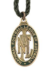 NATIONAL FOOTBALL LEAGUE OF AUSTRALIA BADGE: 9ct gold & enamel badge, with "NFL" monogram surrounded by "National Football League of Australia", engraved on reverse "National Director of Coaching", made by K.G.Luke.