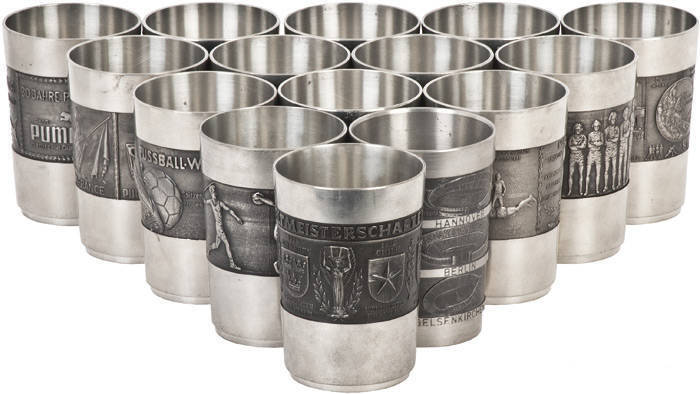 'PUMA' PEWTER MUGS, complete run from 1973-87, each decorated with sporting scenes - Olympics, football, tennis. Beautiful group.