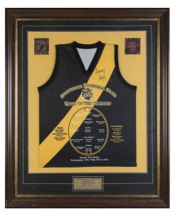 RICHMOND: "Richmond Football Club, Team of the Century" jumper signed by Tommy Hafey, window mounted, framed & glazed, overall 93x114cm. With CoA.