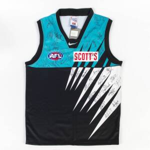 PORT ADELAIDE: 2001 jumper with 38 signatures including Gavin Wanganeen, Warren Tredrea, Chad Cornes, Mark Williams & Matthew Primus.