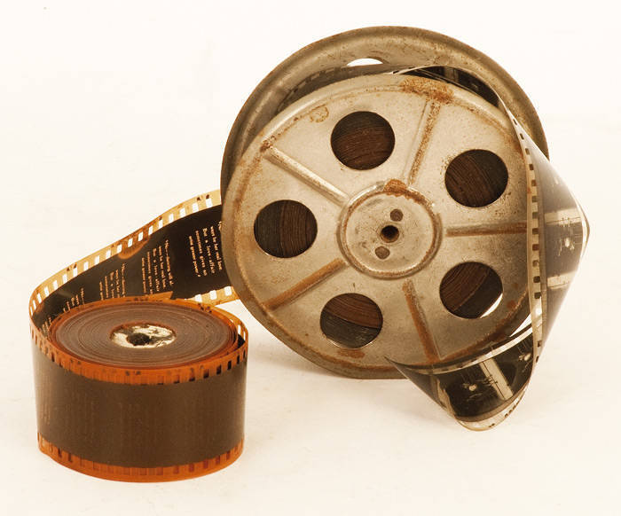 35mm FILM, reel showing boxing match; plus smaller roll showing silent movie.