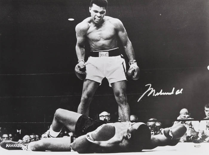 MUHAMMAD ALI signed b w photograph of Ali standing over Sonny