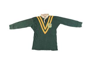 CLIVE CHURCHILL'S 1953 AUSTRALIAN RUGBY LEAGUE JERSEY, with Australian Coat-of-Arms and "Australia/ Rugby League Tour/ 1953" badge on breast, and with number "1" on reverse, and name inside collar "Clive Churchill". Good match worn condition. [Clive Churc