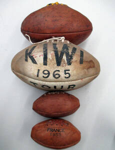 SIGNED FOOTBALLS: Pair of miniature footballs, one signed France 1955, other signed by New Zealand (signatures faded); white football with "Kiwi 1965 Tour" signed by Maunga Emery; small "Autograph" football with c70 signatures of 1950s players.