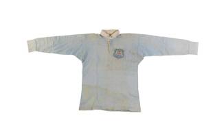 1959 NEW SOUTH WALES RUGBY LEAGUE JERSEY, sky blue wool with embroidered Coat-of-Arms & "N.S.W.R.F.L./ 1959" on left breast, with number "12" on reverse, player unknown. Good match-used condition. 