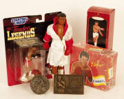 BOXING COLLECTABLES, noted "Timeless Legends" figurines with cards (4); Muhammad Ali figurines (2); box of candy featuring Julio Cesar Chavez; belt buckles (3); key rings (8).