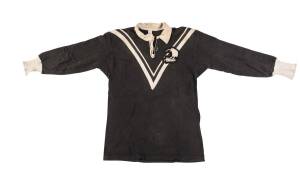 HENRY TATANA'S NEW ZEALAND "KIWIS" JERSEY, black with white "V" and "(kiwi)/  (fern)" badge on left breast, number "8" on reverse. Good match-used condition. [Henry Tatana played 9 Tests for the Kiwis 1967-71, and played for Canterbury Bulldogs & St.Georg