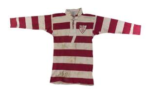 LEE HUTCHINSON'S 1972 QUEENSLAND FIRSTS JERSEY, red & white hoops with embroidered shield "Q.R.L., City Firsts 1972" on left breast, with number "7" on front & reverse, signed "L.Hutchinson" on collar. Good match-used condition. [Lee Hutchinson played 7 m