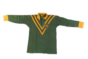 BOB FULTON'S 1974 AUSTRALIAN RUGBY LEAGUE JERSEY, with Australian Coat-of-Arms and "Australian/ Rugby League/ 1974" badge on breast, and with number "3" on reverse. Signed on collar "To Jack, Best wishes, Bob Fulton". Good match worn condition. [Bob Fulto