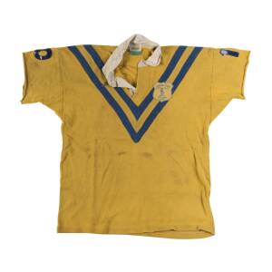 1976 COMBINED SYDNEY JERSEY, yellow with blue & yellow "V", with embroidered "Combined Sydney/ N.S.W. R.F.L./ (Kangaroo)/ N.Z. Tour 1976" badge on left breast, with number "10" on reverse, player unknown, signed inside collar "To Jack Ryder, from Jack Dre