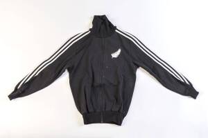 NEW ZEALAND "ALL BLACKS": Group with All Blacks tracksuit with number "28" on pants; training cap 1981 NZ v Springboks; 1989 training shirt with facsimile autographs; All Blacks training shirt; All Blacks shorts. (Total 5 items).