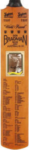 DON BRADMAN, signature on card affixed to full size replica "Sykes - Don Bradman" Cricket Bat, engraved with details of Bradman's record. With CoA.