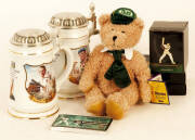 DON BRADMAN COLLECTABLES: Don Bradman Beer Steins (2) - "My Best Innings" & "452 Not Out"; Bradman Museum teddy bear; small statue; waterball; flick book; coasters (2 packs of 6).