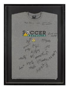 JOHN ALOISI: Signature on replica Socceroos shirt, framed & glazed, overall 88x98cm; plus shirt signed by 1999 "Joeys" World Cup team, framed & glazed, overall 71x95cm.