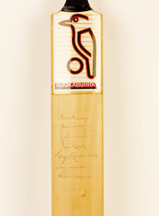 SIGNED CRICKET BAT: Full size "Kookaburra" Cricket Bat with 7 signatures including Ray Lindwall, Neil Harvey & Ian Craig. G/VG condition.