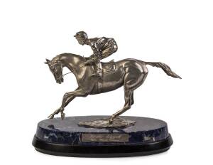 "Lester Piggott, The Final Frame", An impressive sterling silver sculpture of a racehorse and the famous jockey by Garrard's & Co Ltd. London 1985