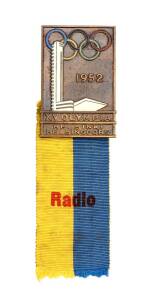 1952 HELSINKI OLYMPICS: Official Badge for Press, rectangular tombac, with yellow & blue ribbon lettered "Radio". Ex Australian broadcaster Norman Banks.