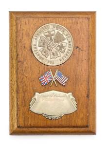  Plaque with "The Amateur Athletic Union of Australia" medallion, over crossed Union Jack & Stars and Stripes, with plate engraved "British Empire & Commonwealth v U.S.A., Sydney 1956". {This meeting was held in Sydney immediately after the 1956 Melbourne