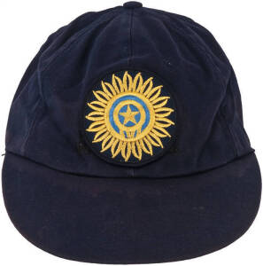 MOHAMMAD AZHARUDDIN'S INDIAN TEST CAP, blue baseball-style cap with Indian badge on front, and embroidered "India v West Indies 1994" on reverse, tag inside endorsed "Azza". Good match-worn condition. Ex Allan Wells benefit auction 1996. With CoA. [Mohamm