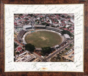 WEST INDIES CRICKETERS: Colour photograph of Queen's Park Oval Trinidad, with 100 signatures on the mount including Colin Croft, Joel Garner, Gordon Greenidge, Wes Hall, Desmond Haynes, Clive Lloyd, Malcolm Marshall, Vivian Richards, Garfield Sobers & Eve