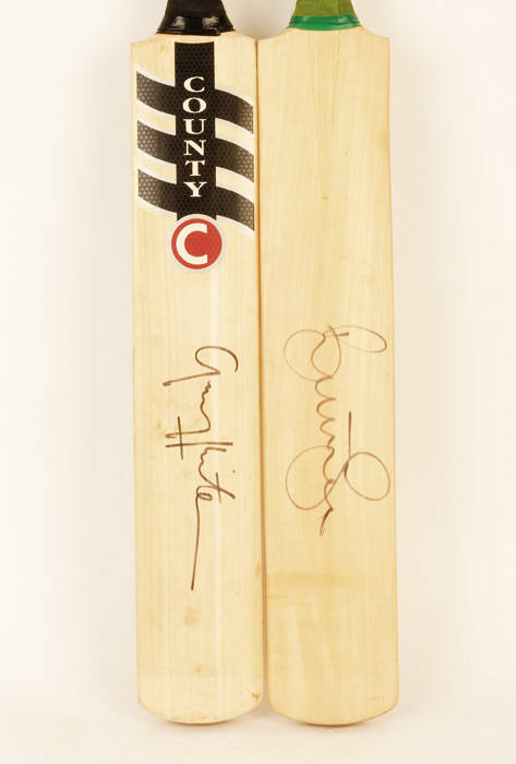 SIGNED CRICKET BATS: Cricket bats signed by Brett Lee & Gary Kirsten.