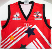 CLOTHING & FLAGS: E.J.Whitten Legends Game football jumper; Brisbane Bears flags (2 flown & 1 new); Brisbane Lions flags (1 flown & 1 new); AFL ties (2); AFL Centenary cap; Goal Umpire's jacket.