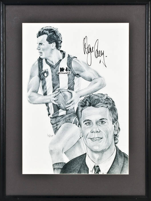 IAN BROCK PRINTS: Signed prints of Tony Shaw (Collingwood) & Wayne Carey (North Melbourne) by Ian Brock, both window mounted, framed & glazed, each overall 56x71cm.