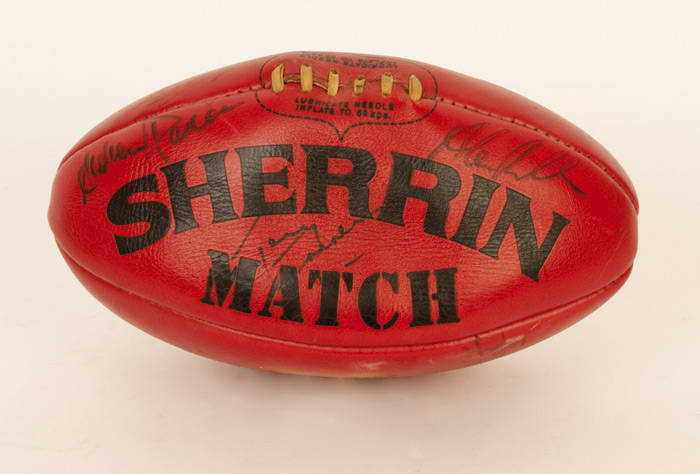 FOOTBALLS: "Sherrin - 1996 AFL Centenary" football with c21 North Melbourne signatures, in perspex display case (damaged); plus four other footballs (one with signatures including Leigh Matthews).