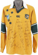 2003 WALLABIES: Australian Wallabies jersey signed by 2003 Rugby World Cup team, with 34 signatures including George Gregan, Elton Flatley, Mat Rogers, Chris Latham & Lote Tuqiri.