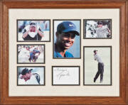 TIGER WOODS, "The 1997 Masters" display (Tiger Wood's first major championship) comprising signed card, window mounted with six photographs, framed & glazed, overall 57x47cm. (Signature a trifle faded, though nice early display).