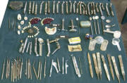 A range that includes drill bits, mirrors, dental scalers and scrapers and various other items.