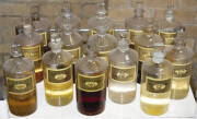 DISPENSING BOTTLES: with polished pontils, labels, 18cm tall, all in good condition & all with stoppers.