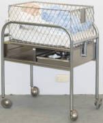 Baby's crib on custom trolley.