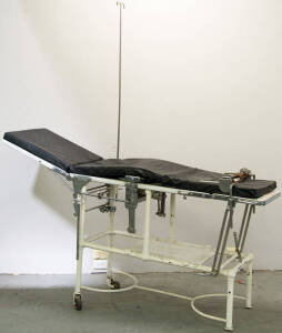 Multi adjustable operating table (with two wheels) "Whiteline Table" 1904 Scanlan-Morris Co. of Madison Wisconsin.