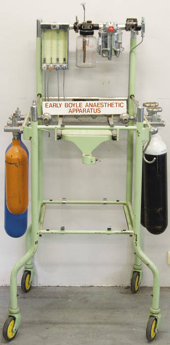 Boyle type apparatus by C.I.G. on green metal 4 wheeled trolley.